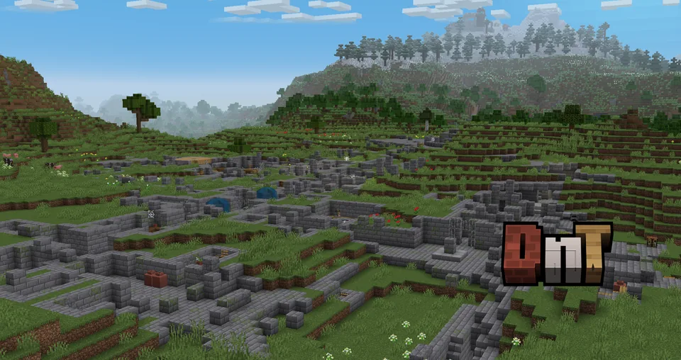 A stone bunker structure exposed on the surface in Minecraft