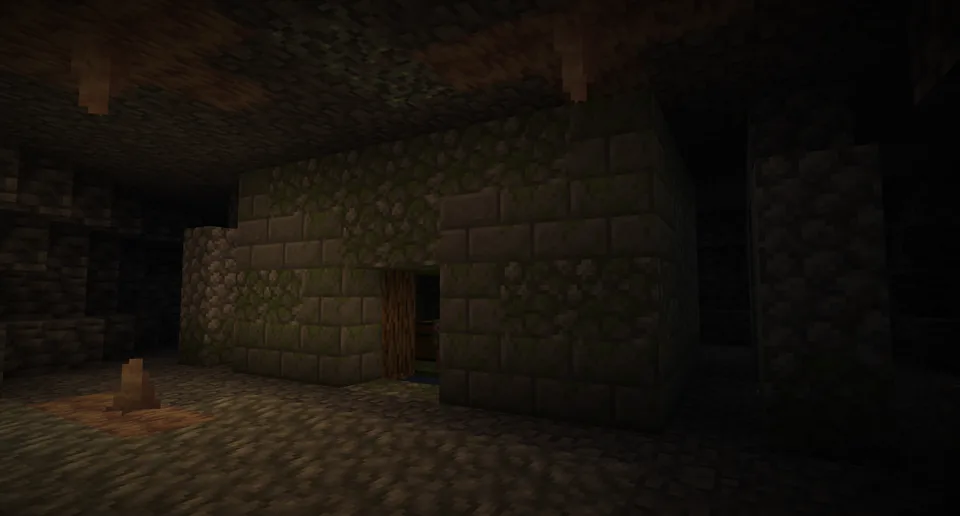 A ruined chamber embedded in a natural Minecraft cave system