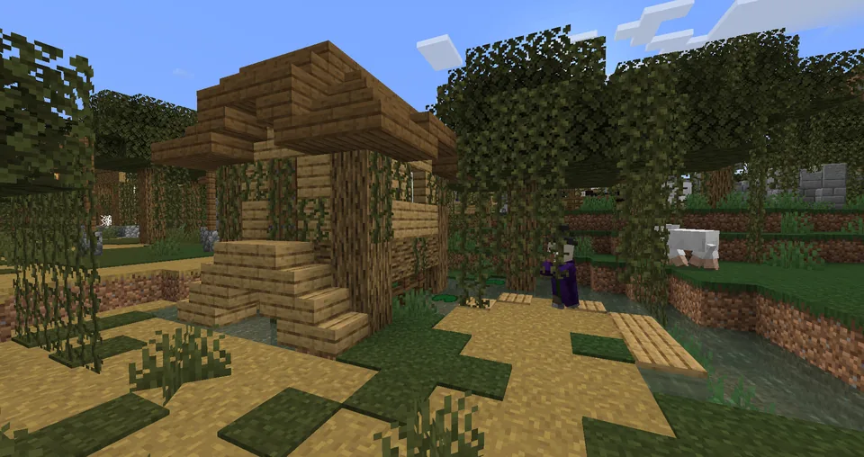 A village with wooden huts built over swamp water in Minecraft